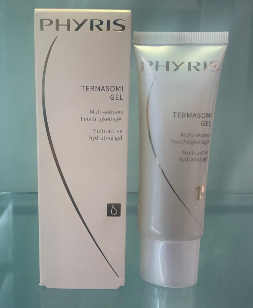 A tube of phyris termaskin gel is sitting next to its box.